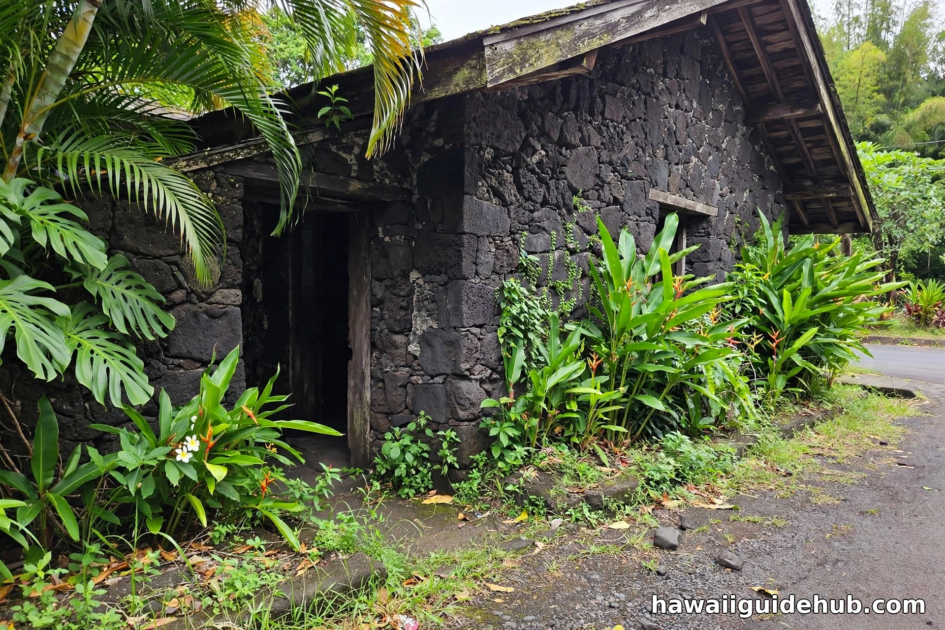 Historic Kauai Museum building with lava rock walls on Rice Street in Lihue, Hawaii