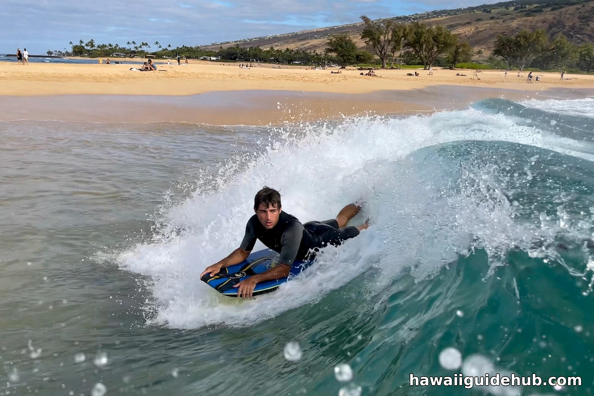 Bodyboarder riding a shorebreak wave at Big Beach, Makena, Maui